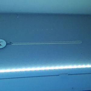 Long strand of fake dress pearls